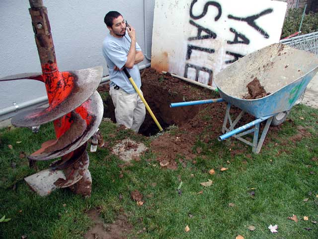 Removing dirt with a shovel